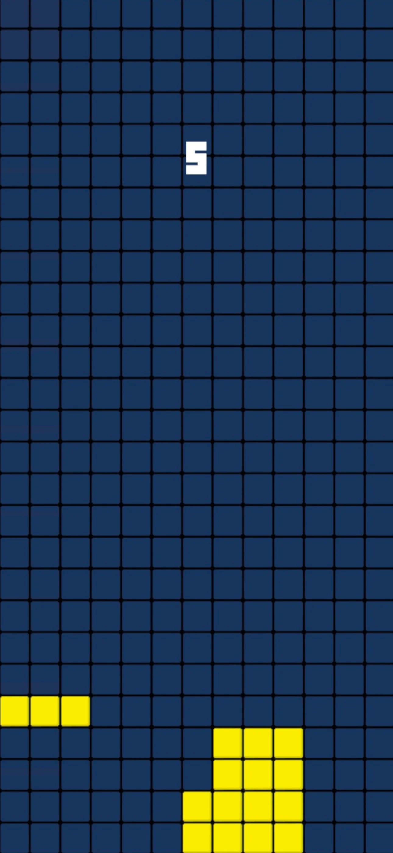 Stack 8 in play on a blue grid, a score of 5 above two clusters of yellow blocks